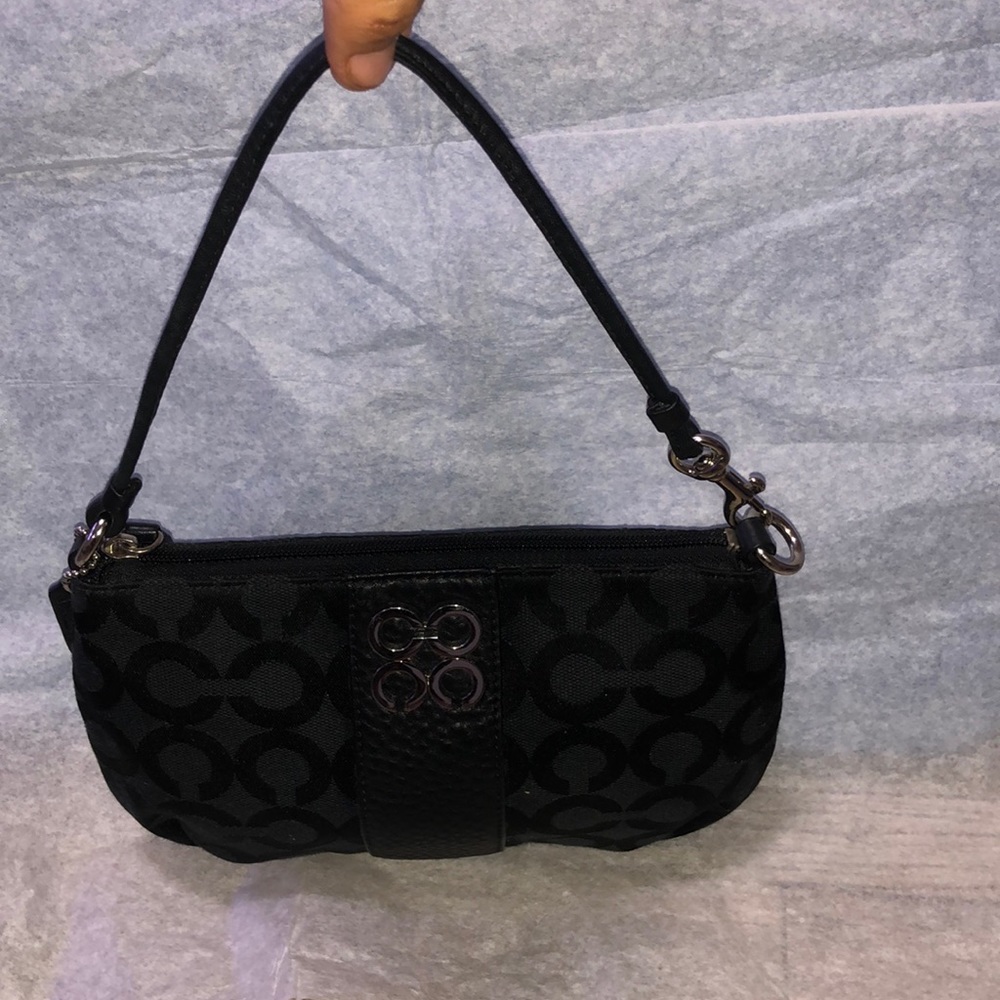 Black coach wristlet with silver hardware